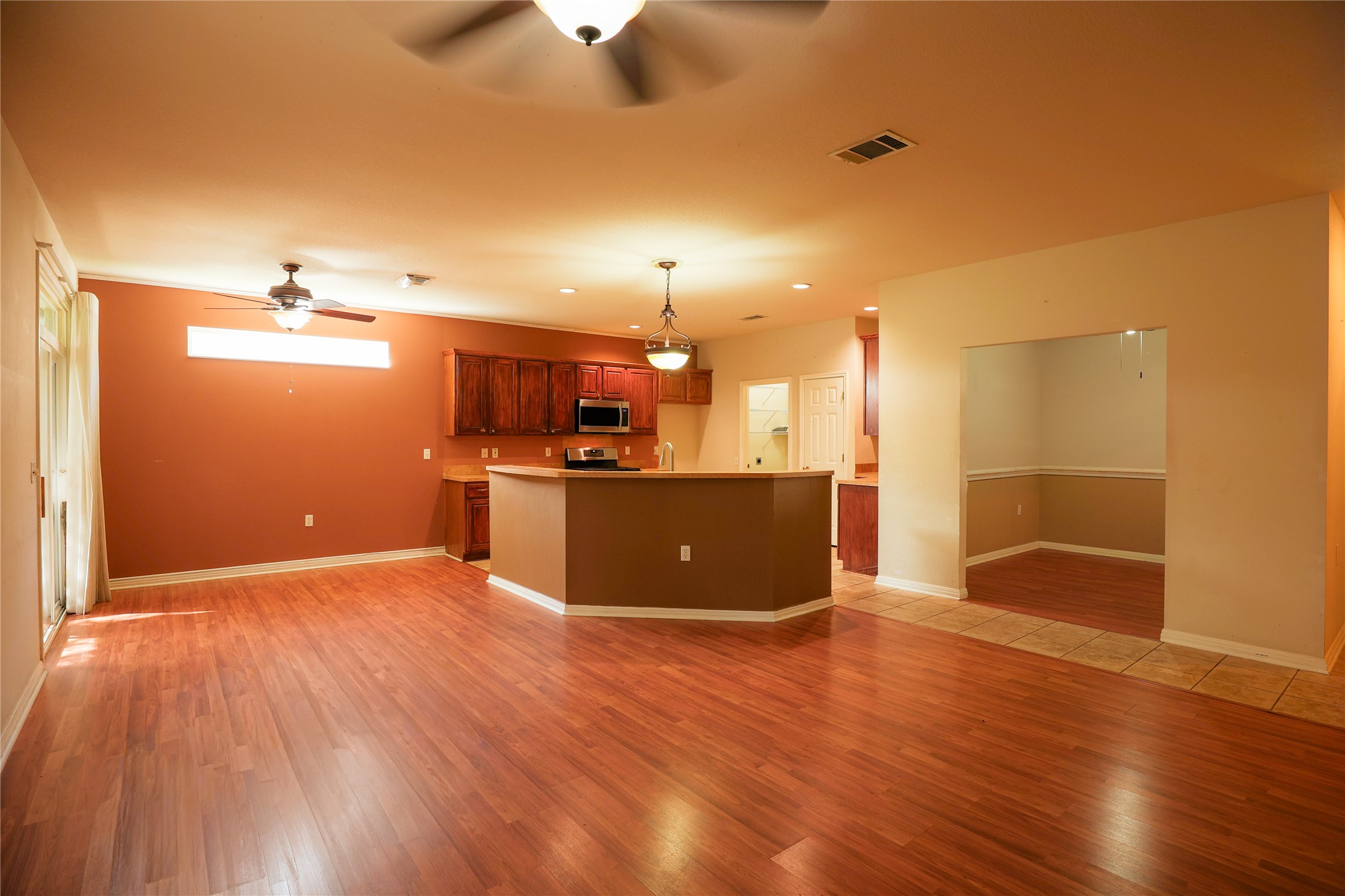 225 Red Poppy Trail Georgetown, TX 78633 - Photo 6 of 15 An open-concept living area seamlessly into the kitchen and dining room and nearby office space