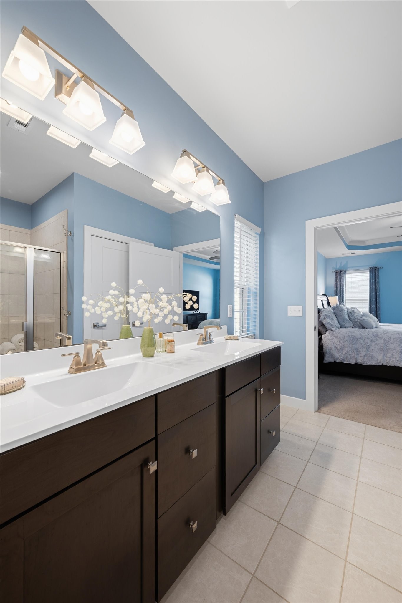910 Caywood Road Smyrna, TN 37167 - Photo 21 of 49 a spacious bathroom with a double vanity sink and a mirror