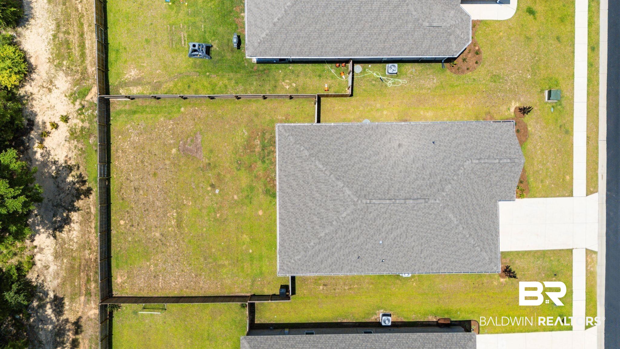 13966 Antler Hl Road Daphne, AL 36527 - Photo 36 of 44 Expansive fenced backyard with a cleared area