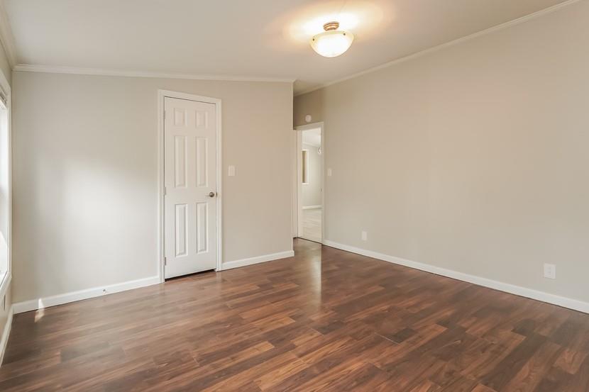 1413 Wimpole Street Aliquippa, PA 15001 - Photo 11 of 15 a view of an empty room with wooden floor