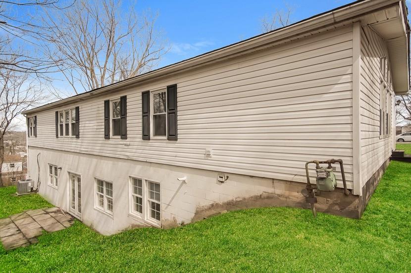 1413 Wimpole Street Aliquippa, PA 15001 - Photo 15 of 15 a view of a house with a yard