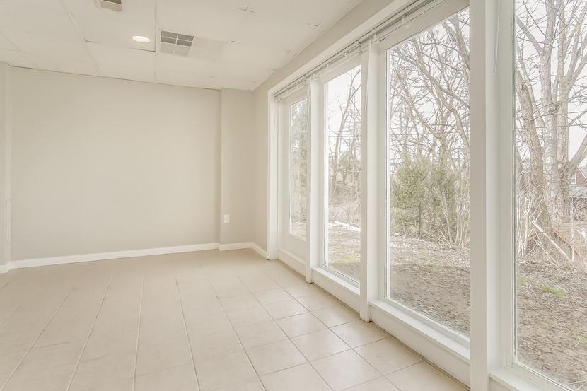 1413 Wimpole Street Aliquippa, PA 15001 - Photo 3 of 15 a view of an empty room and window