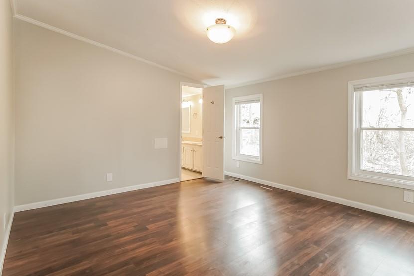 1413 Wimpole Street Aliquippa, PA 15001 - Photo 10 of 15 an empty room with wooden floor and windows