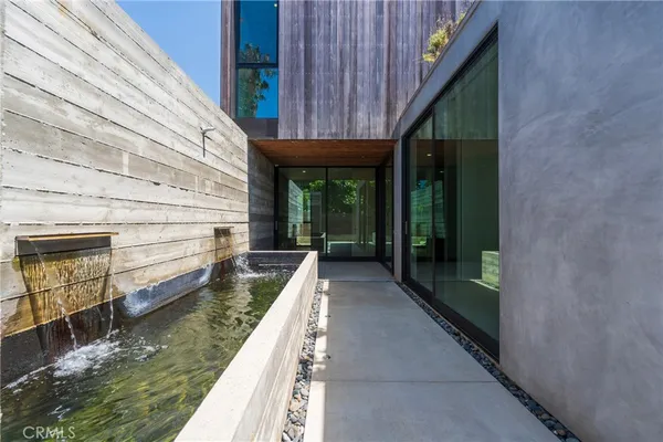 a view of swimming pool with outdoor seating