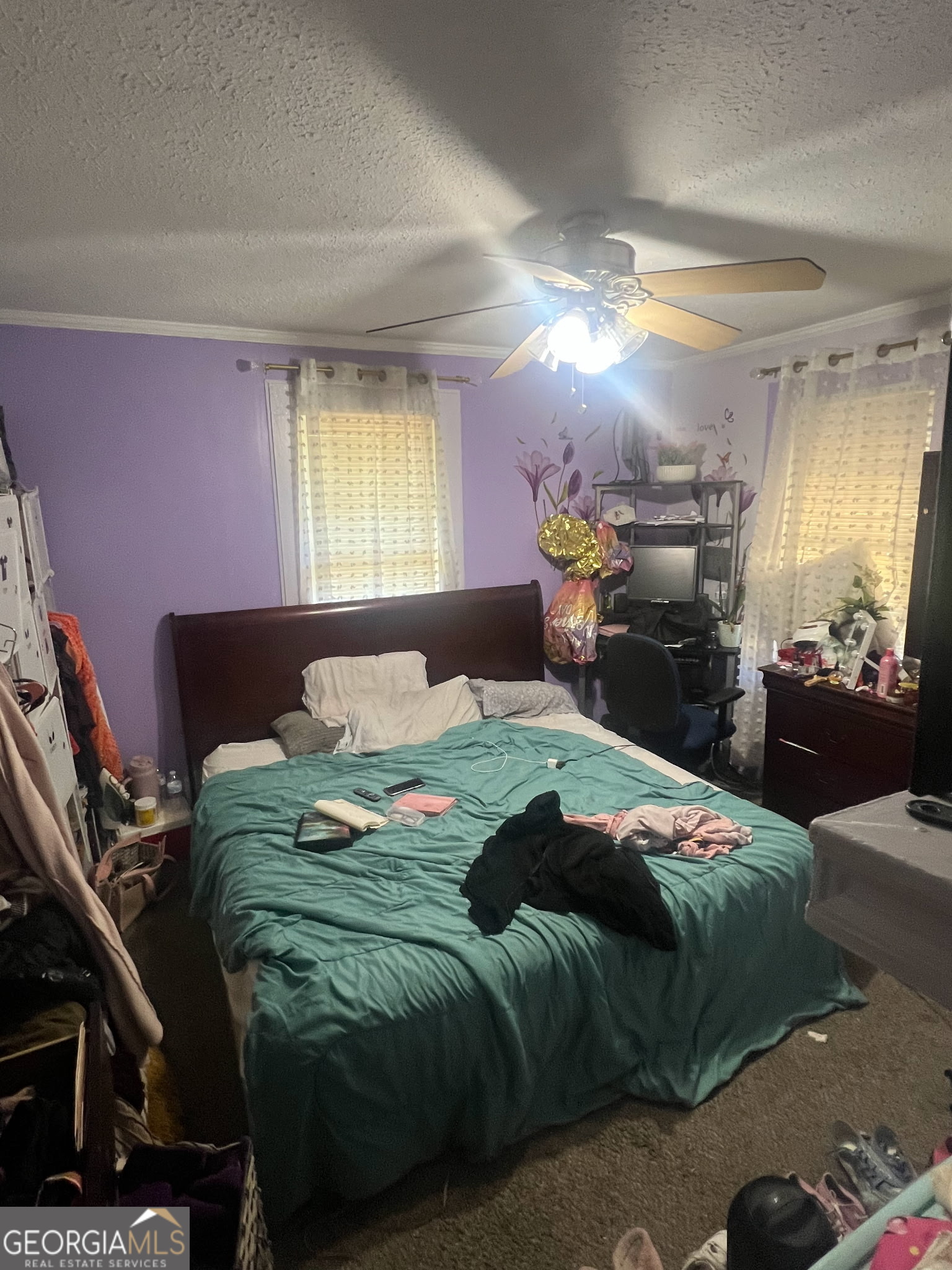 856 Grady Street Macon, GA 31206 - Photo 13 of 23 a bedroom with a bed and a tv