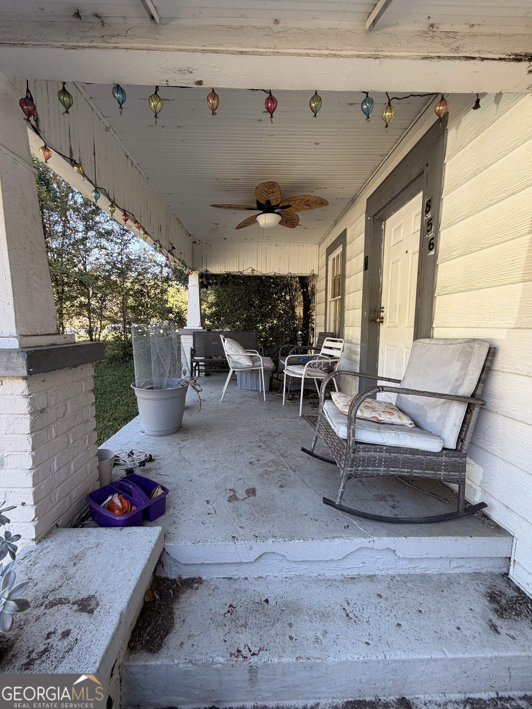 856 Grady Street Macon, GA 31206 - Photo 3 of 23 a living room with furniture and a potted plant