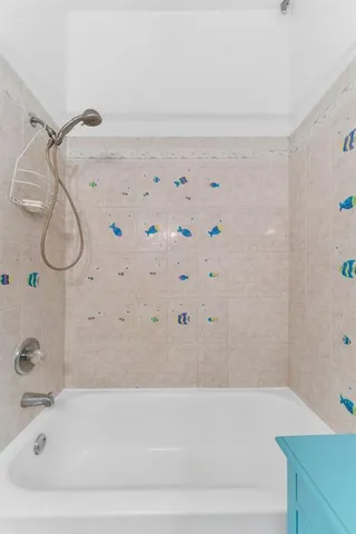 a bathroom with a bathtub