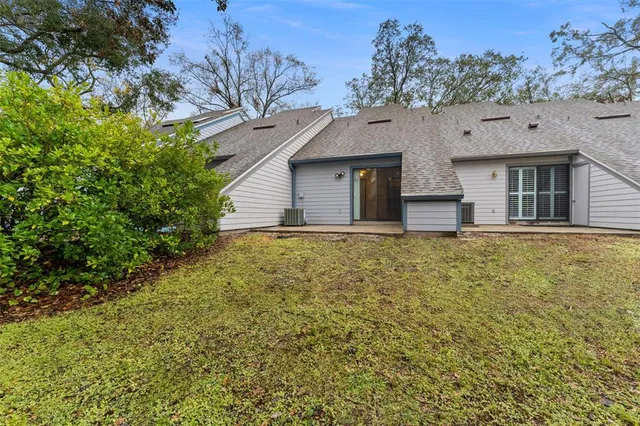 a house with trees in front of it