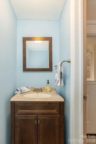 a bathroom with a sink and a vanity