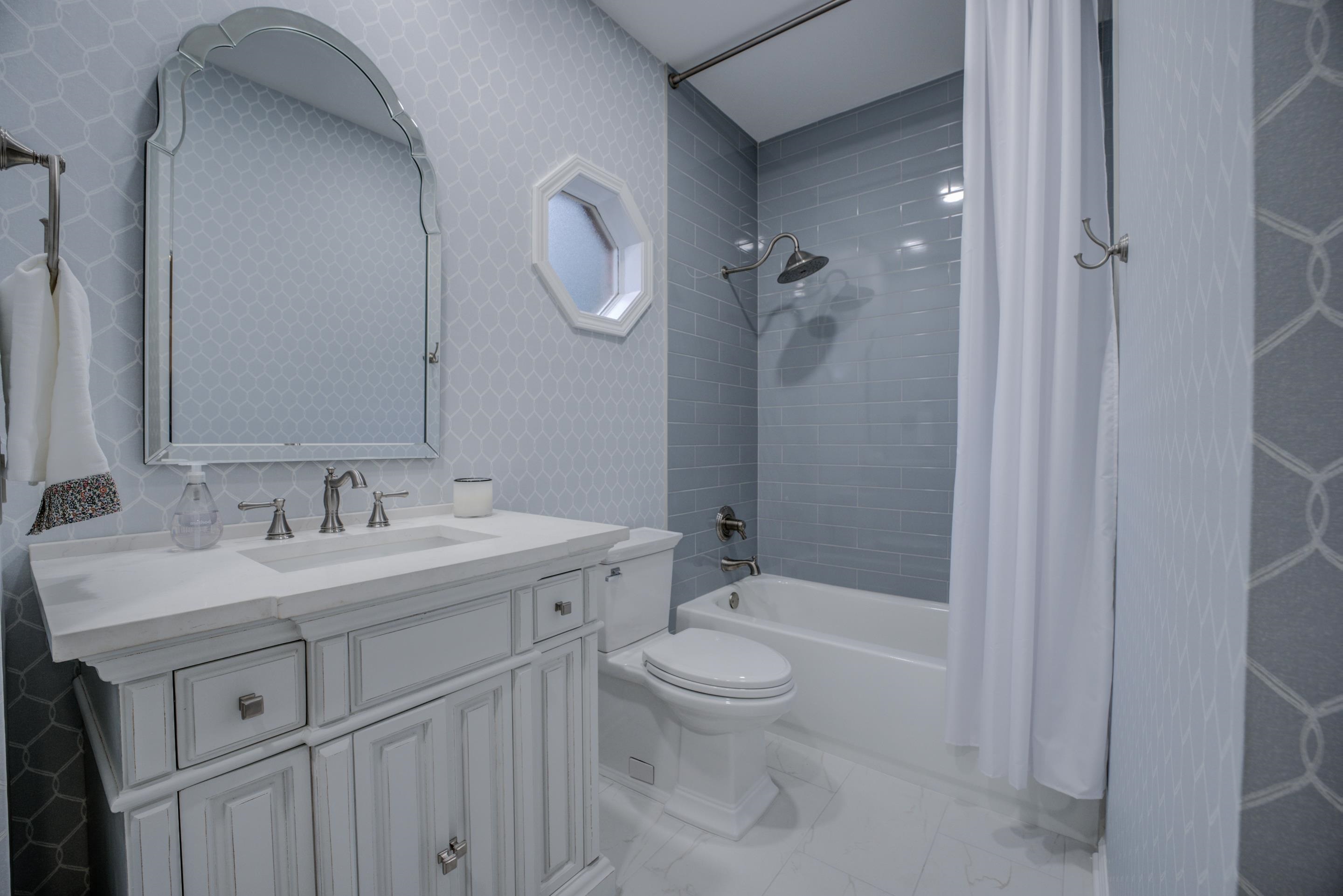 1594 John Ridge Drive Collierville, TN 38017 - Photo 17 of 29 Full bathroom with shower / bath combo, vanity, and toilet