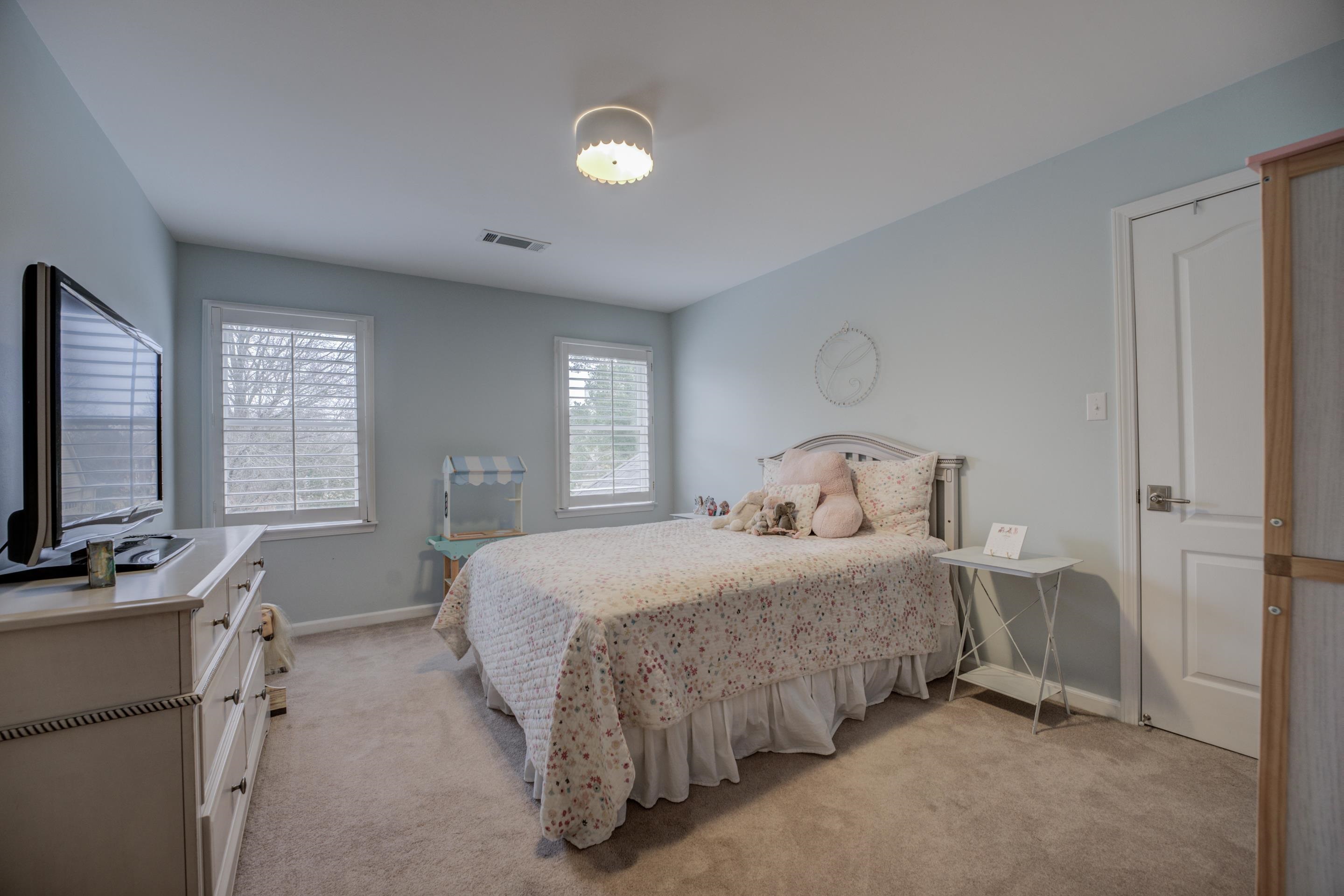 1594 John Ridge Drive Collierville, TN 38017 - Photo 18 of 29 Bedroom with light colored carpet