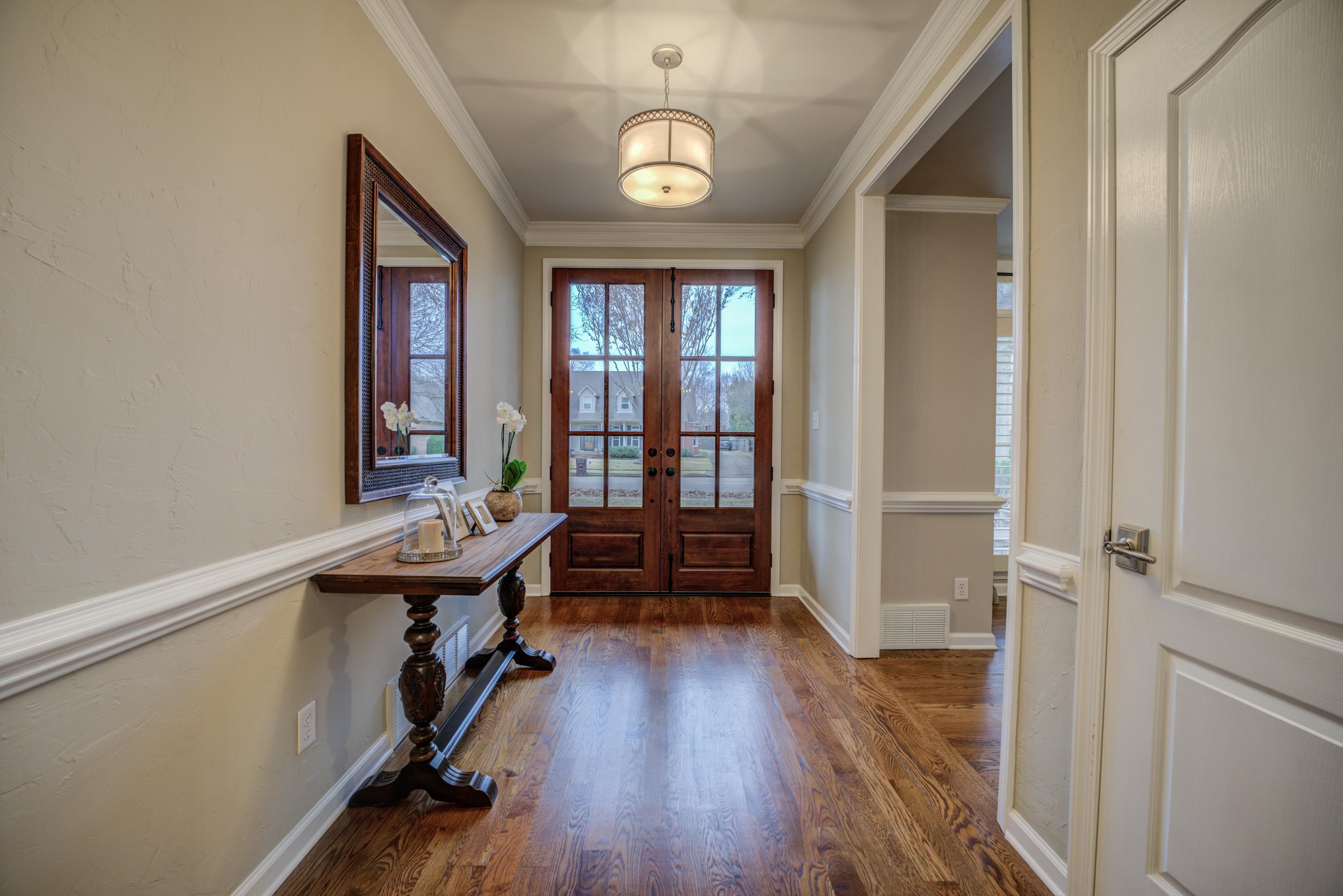 1594 John Ridge Drive Collierville, TN 38017 - Photo 3 of 29 Entryway with french doors, dark wood-type flooring, and ornamental molding