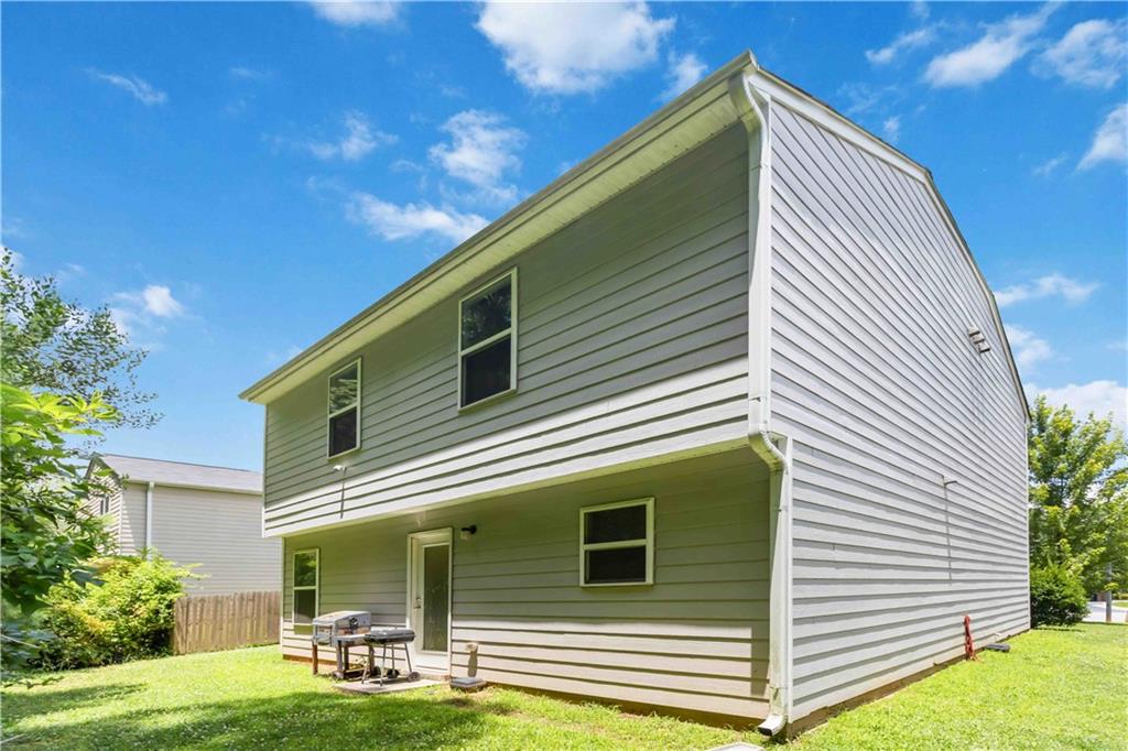 5622 Laurel Ridge Drive Atlanta, GA 30344 - Photo 22 of 23 a backyard of a house with outdoor seating