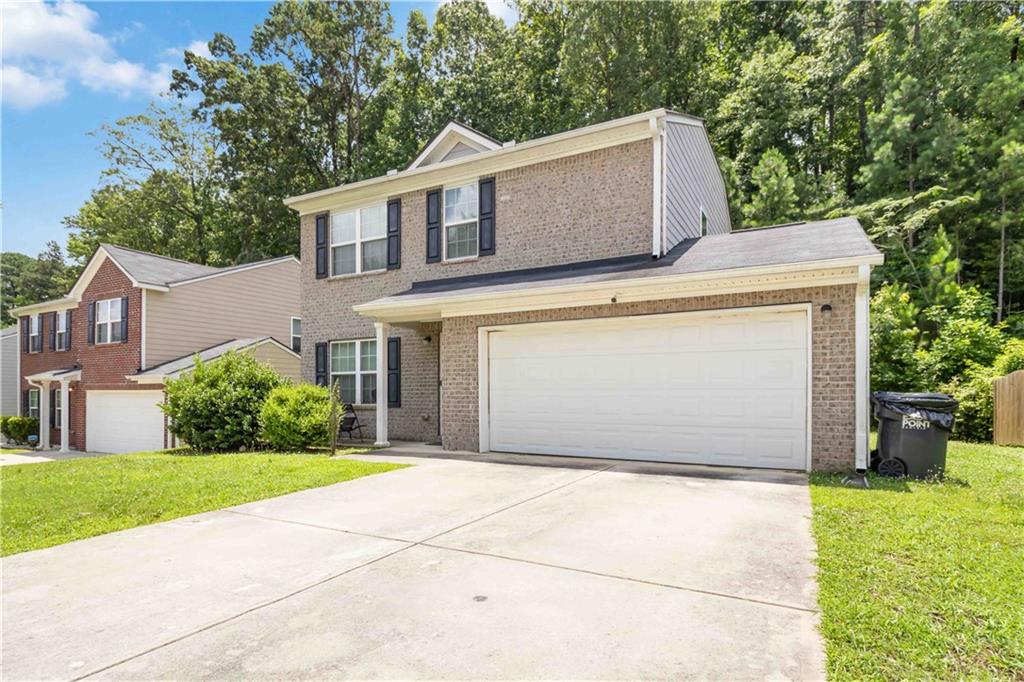 5622 Laurel Ridge Drive Atlanta, GA 30344 - Photo 23 of 23 a front view of house with yard