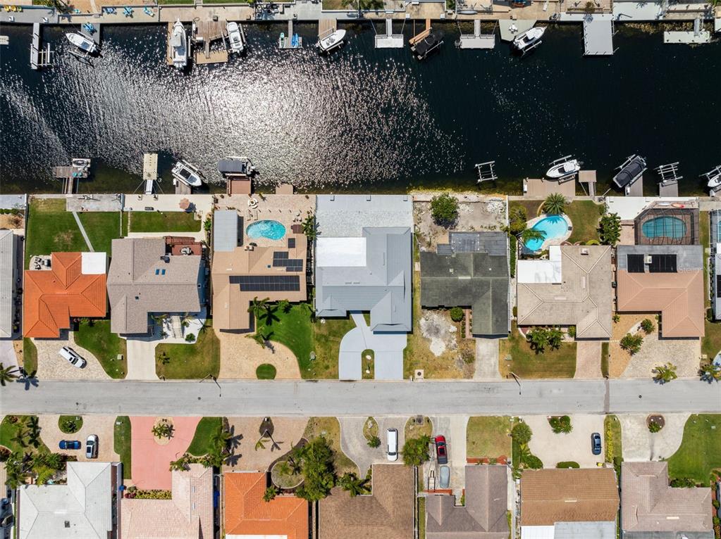 5041 Cabrilla Court New Port Richey, FL 34652 - Photo 2 of 43 an aerial view of residential houses with outdoor space