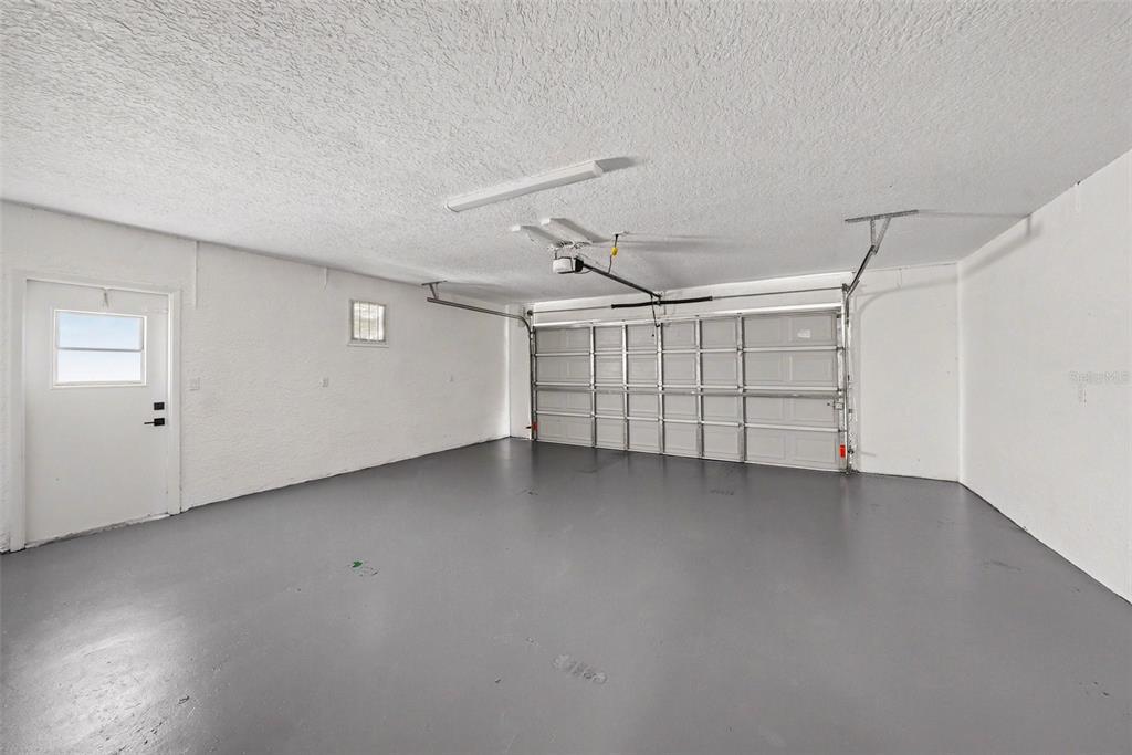 5041 Cabrilla Court New Port Richey, FL 34652 - Photo 34 of 43 a view of a garage