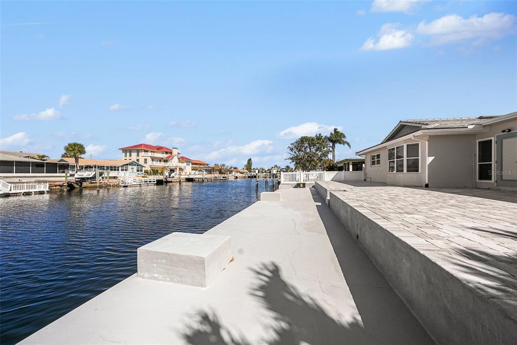 5041 Cabrilla Court New Port Richey, FL 34652 - Photo 39 of 43 a view of swimming pool with outdoor seating