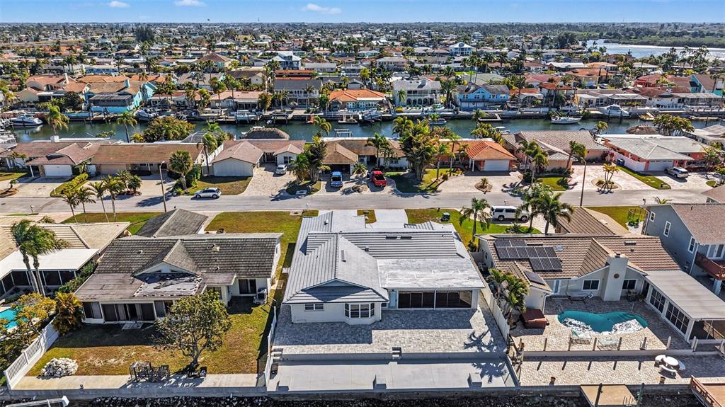 5041 Cabrilla Court New Port Richey, FL 34652 - Photo 8 of 43 an aerial view of residential houses with outdoor space