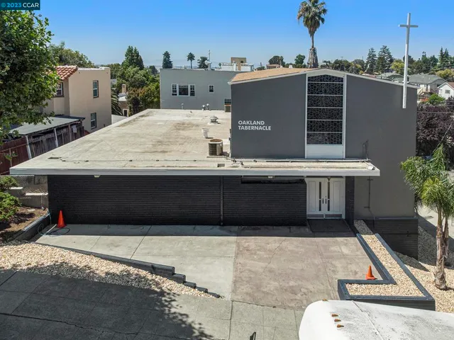 a view of a house with a terrace