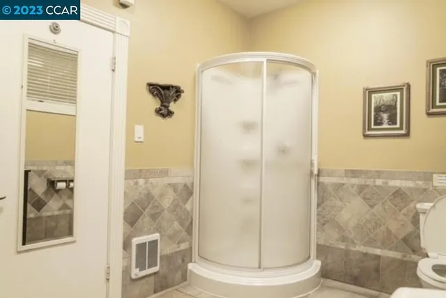 a kitchen with a sink cabinets and a window