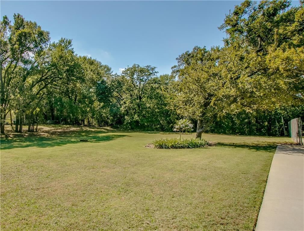 0 Parcel Id, Unit R07794 Lewisville, TX 75057 - Photo 1 of 1 a view of a field with trees in the background