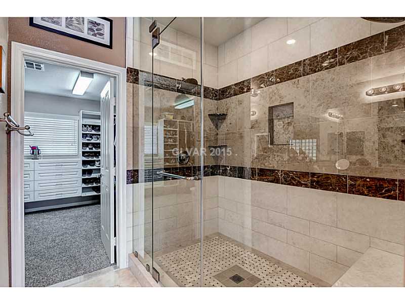 265 Violet Note Street Henderson, NV 89074 - Photo 13 of 20 Master Bath/Spa. Custom Master Shower, leading to custom walk-in closet.
