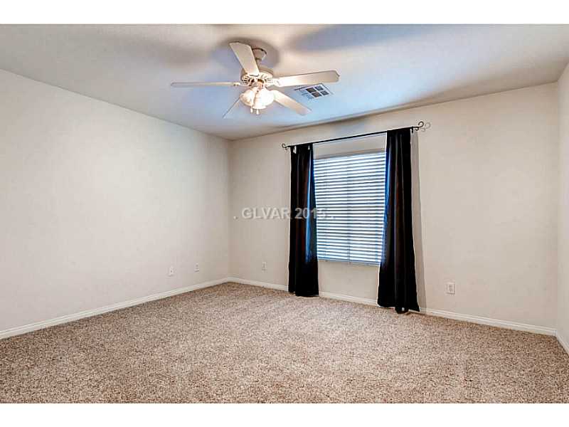 265 Violet Note Street Henderson, NV 89074 - Photo 15 of 20 Bedroom. Upstairs, with walk-in closet