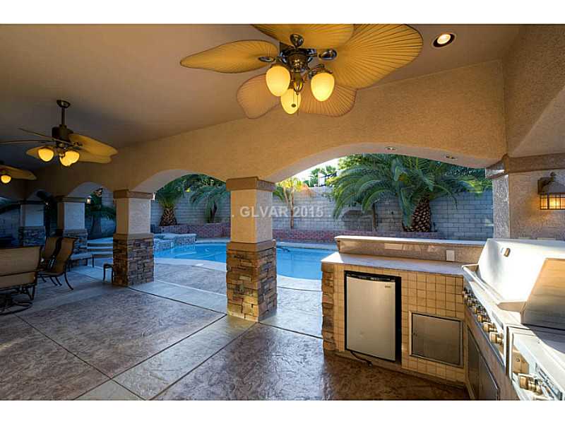 265 Violet Note Street Henderson, NV 89074 - Photo 18 of 20 Exterior Back. Built-in BBQ with Fridge and storage