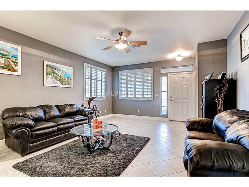 265 Violet Note Street Henderson, NV 89074 - Photo 3 of 20 Living Room. Front entrance, next to Dining room.