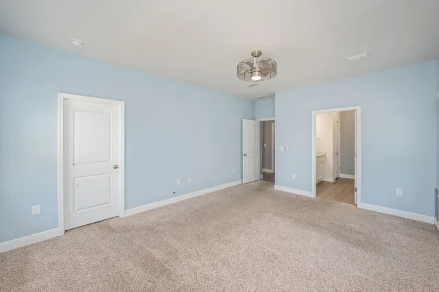 a view of a room with racks on the wall