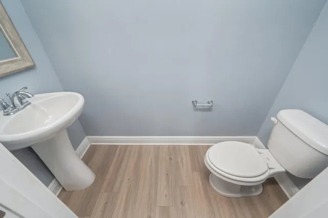 an empty room with a mirror