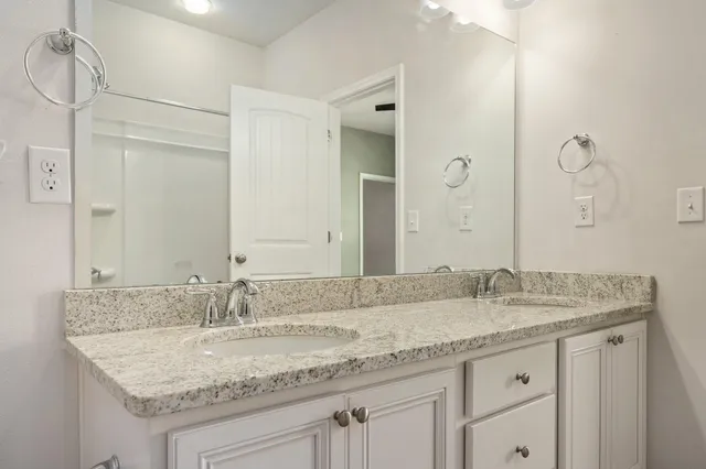 a view of a lake with a yard