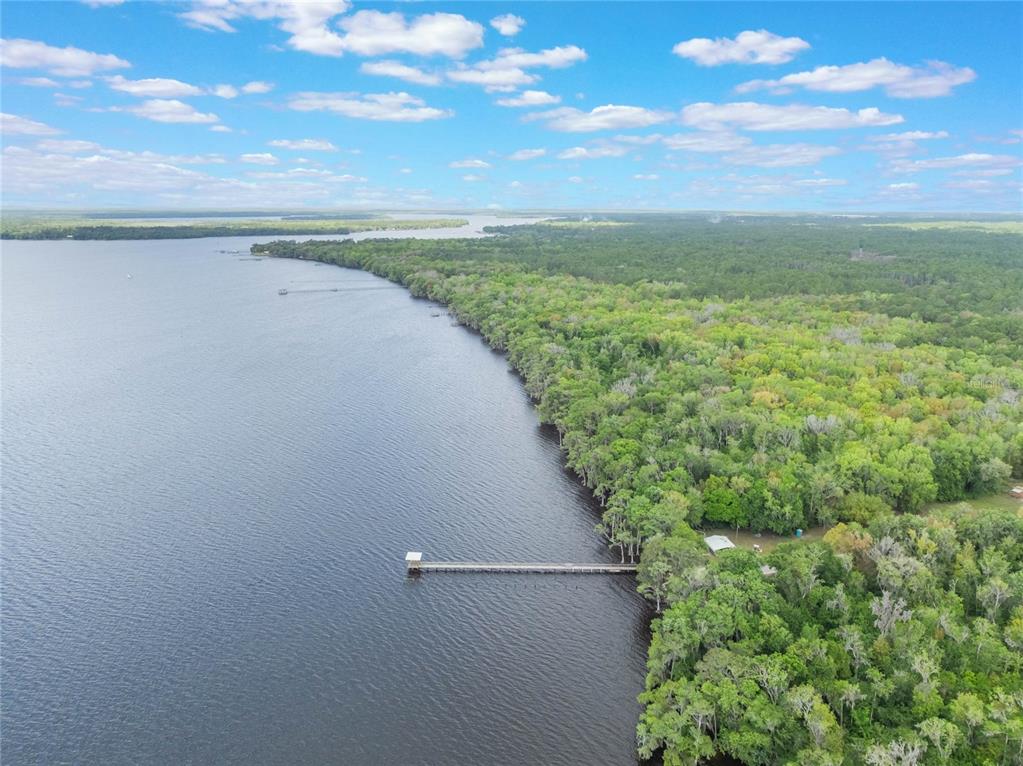 515 Gardenia Avenue Georgetown, FL 32139 - Photo 19 of 25 a view of a lake with a city view