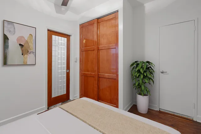 wooden floor area with potted plant