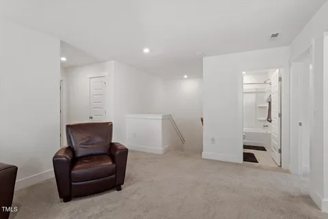 a bathroom with a sink toilet tub and shower