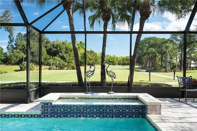 a view of a lake with a big yard