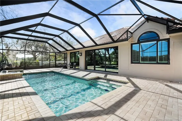 an aerial view of residential house with outdoor space