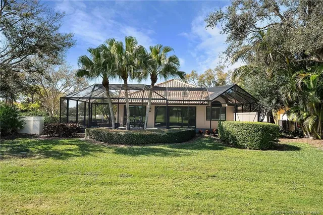 an aerial view of a house with outdoor space