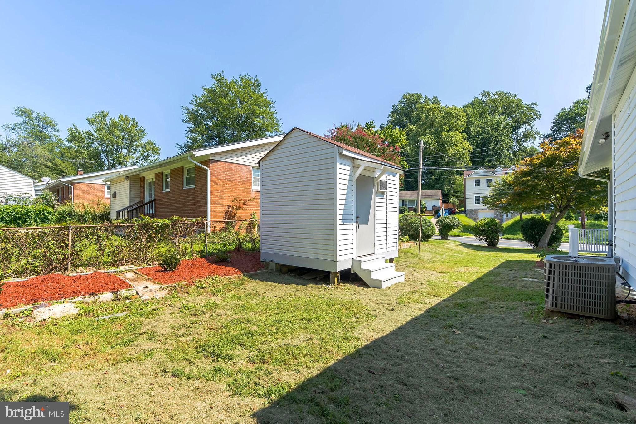 11301 Mapleview Drive Silver Spring, MD 20902 - Photo 27 of 30 Sunny Backyard with Storage Shed