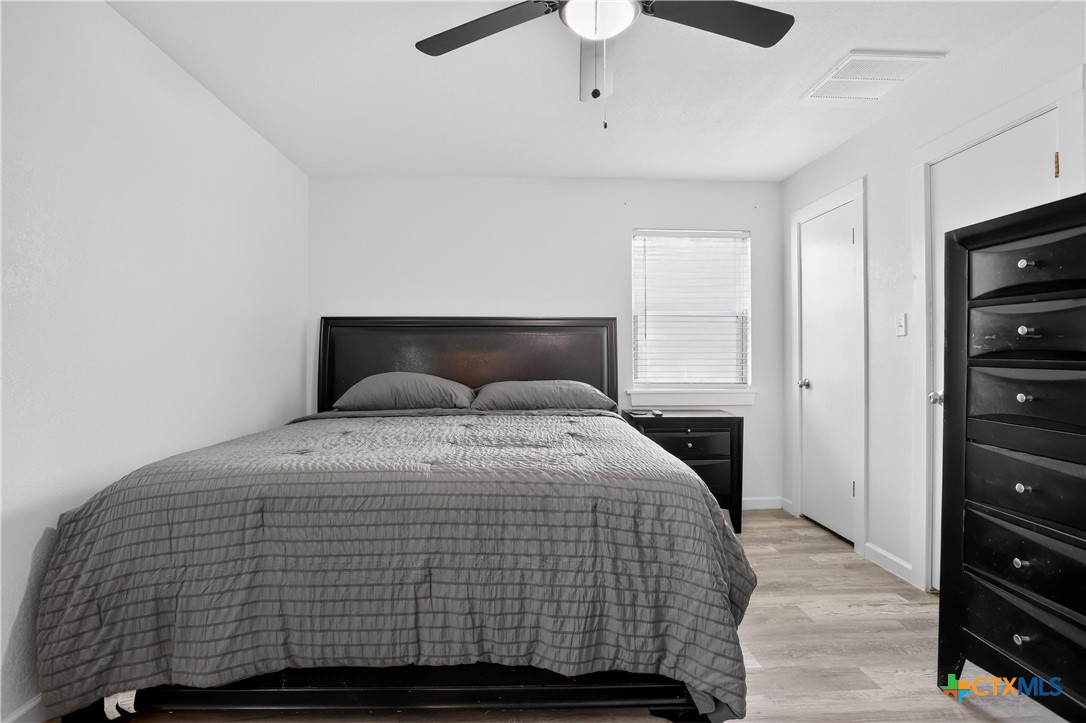 2539 County Road 347 Loop Gause, TX 77857 - Photo 15 of 25 a bedroom with a bed and a closet