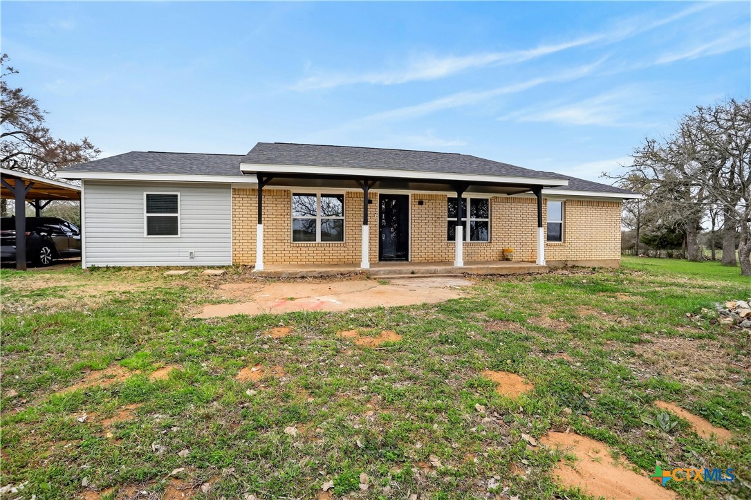 2539 County Road 347 Loop Gause, TX 77857 - Photo 23 of 25 a house that has a tree in front of it