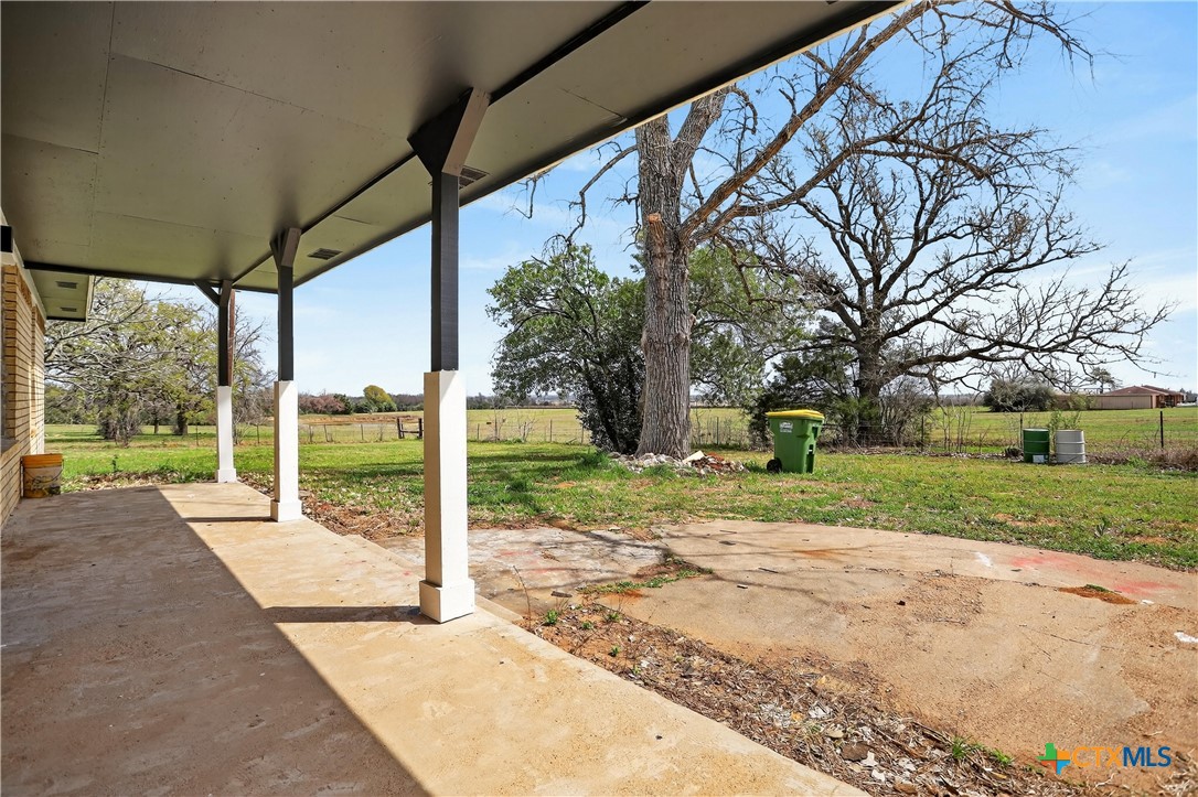 2539 County Road 347 Loop Gause, TX 77857 - Photo 25 of 25 a view of a house with backyard and trees