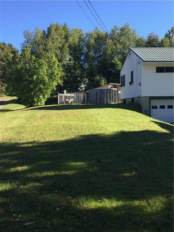 944 Main Street Corinth, ME 04427 - Photo 21 of 28 large side lawn area