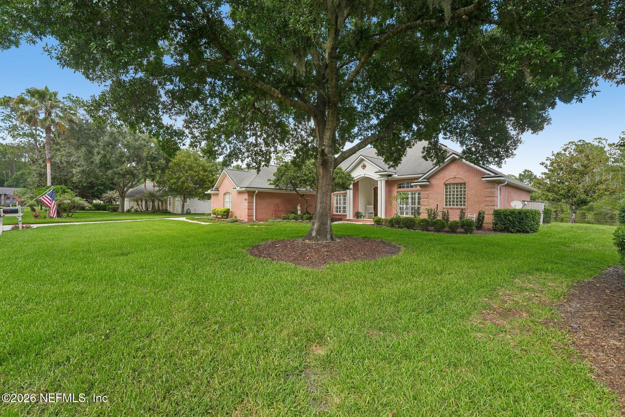 1749 Preserve Point Terrace Fleming Island, FL 32003 - Photo 7 of 60 Mature landscaping Elevation