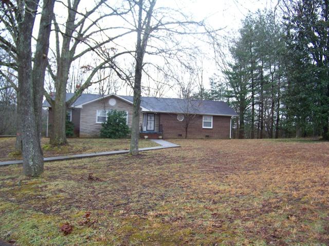 937 Toliver Lake Road Manchester, TN 37355 - Photo 1 of 18 Nice front view with lots of wooded shade