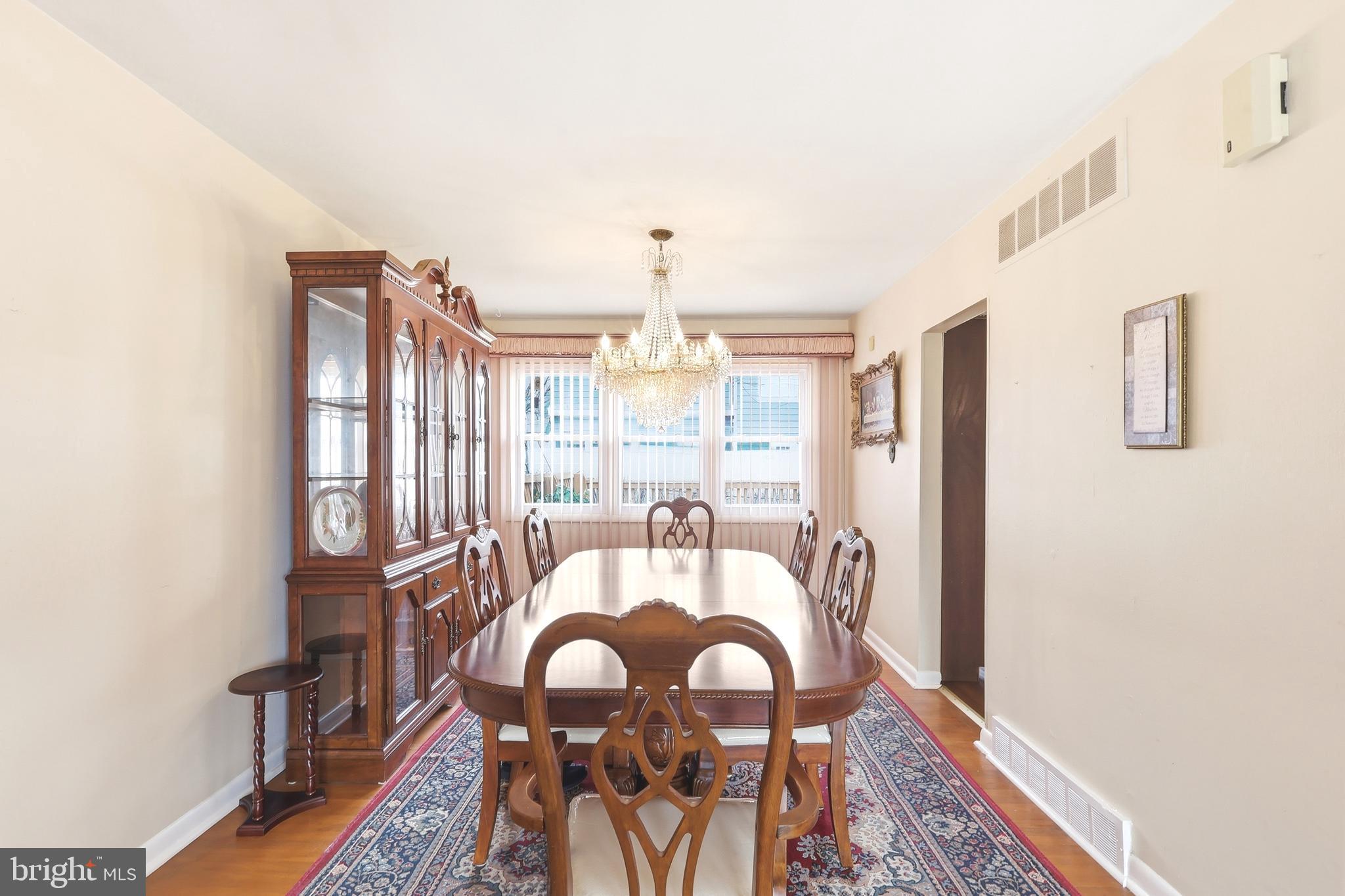 123 Pocasset Road Philadelphia, PA 19115 - Photo 17 of 35 a view of a dining room with furniture window and wooden floor