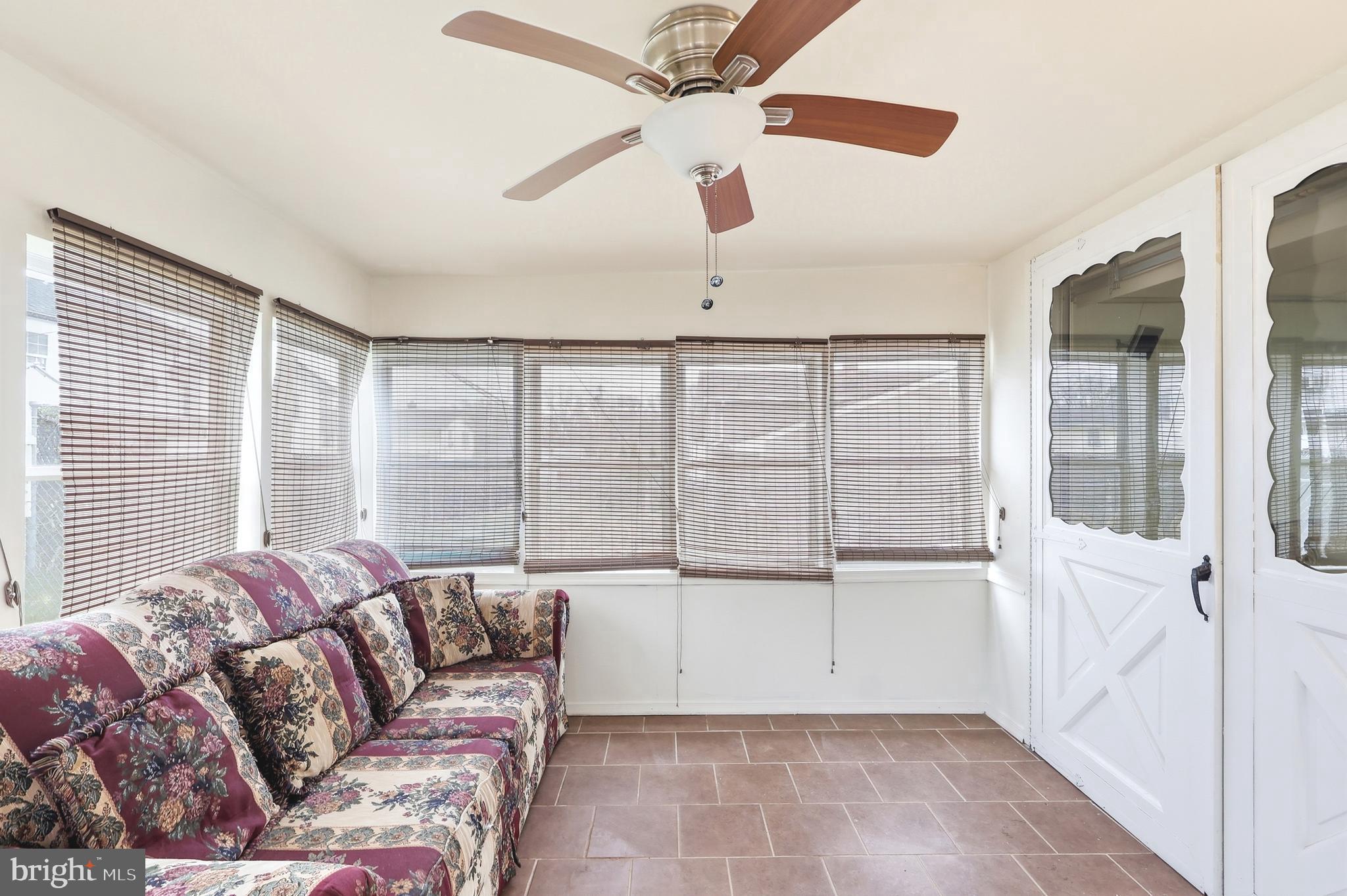 123 Pocasset Road Philadelphia, PA 19115 - Photo 24 of 35 a living room with furniture and a large window