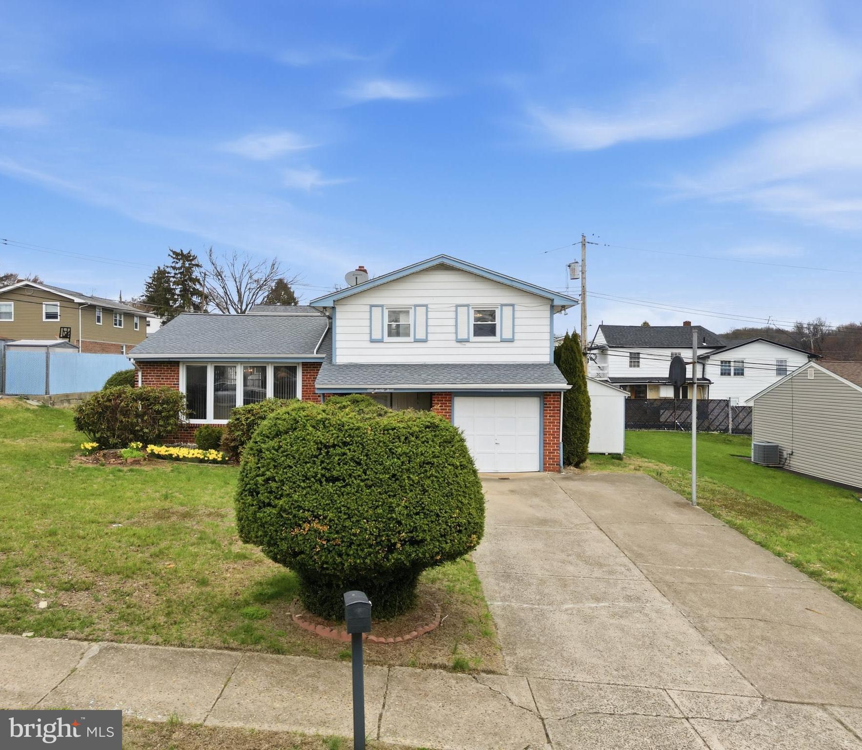 123 Pocasset Road Philadelphia, PA 19115 - Photo 4 of 35 a front view of a house with garden