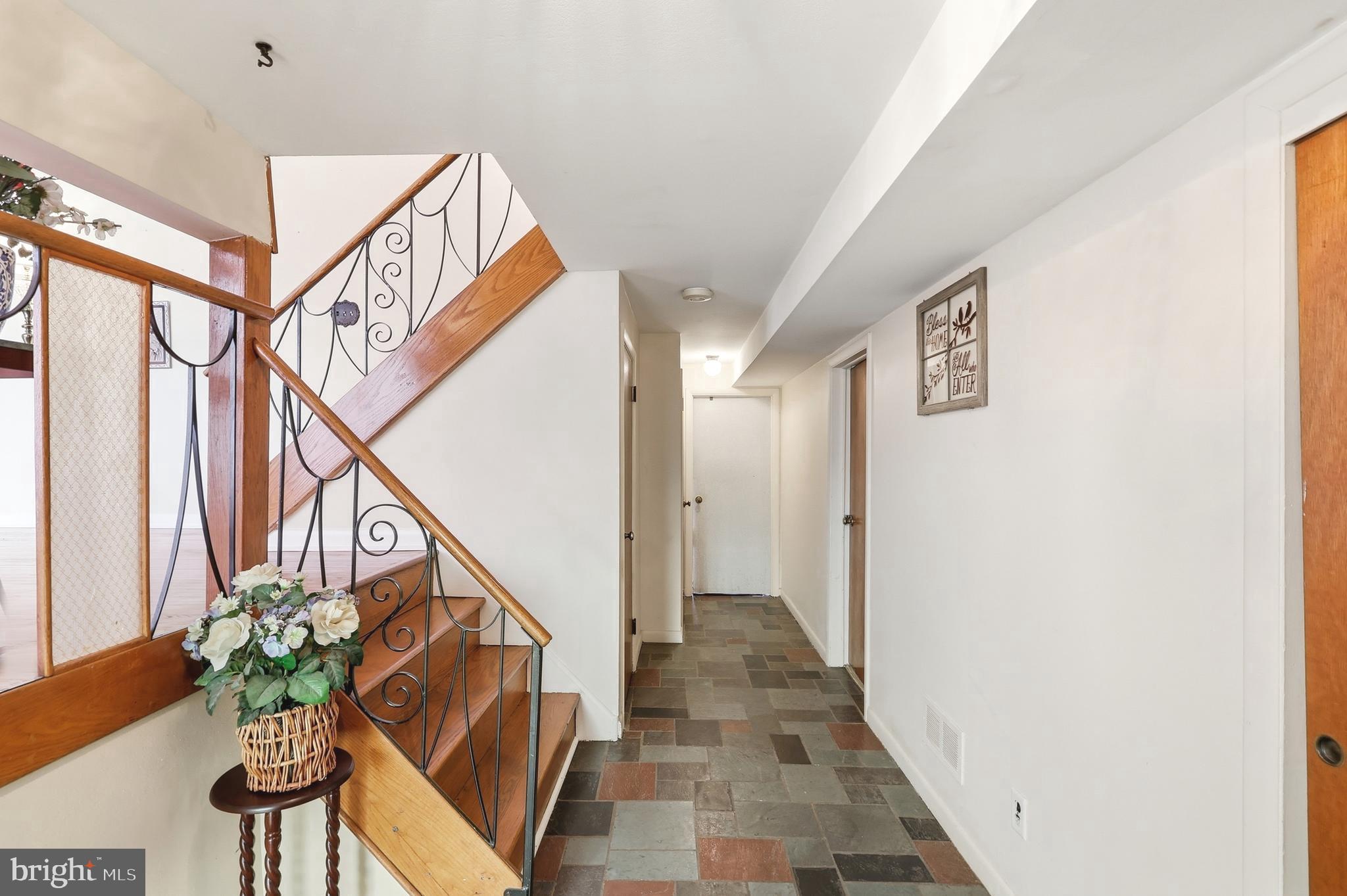 123 Pocasset Road Philadelphia, PA 19115 - Photo 5 of 35 a very nice looking hallway with wooden floor and stairs