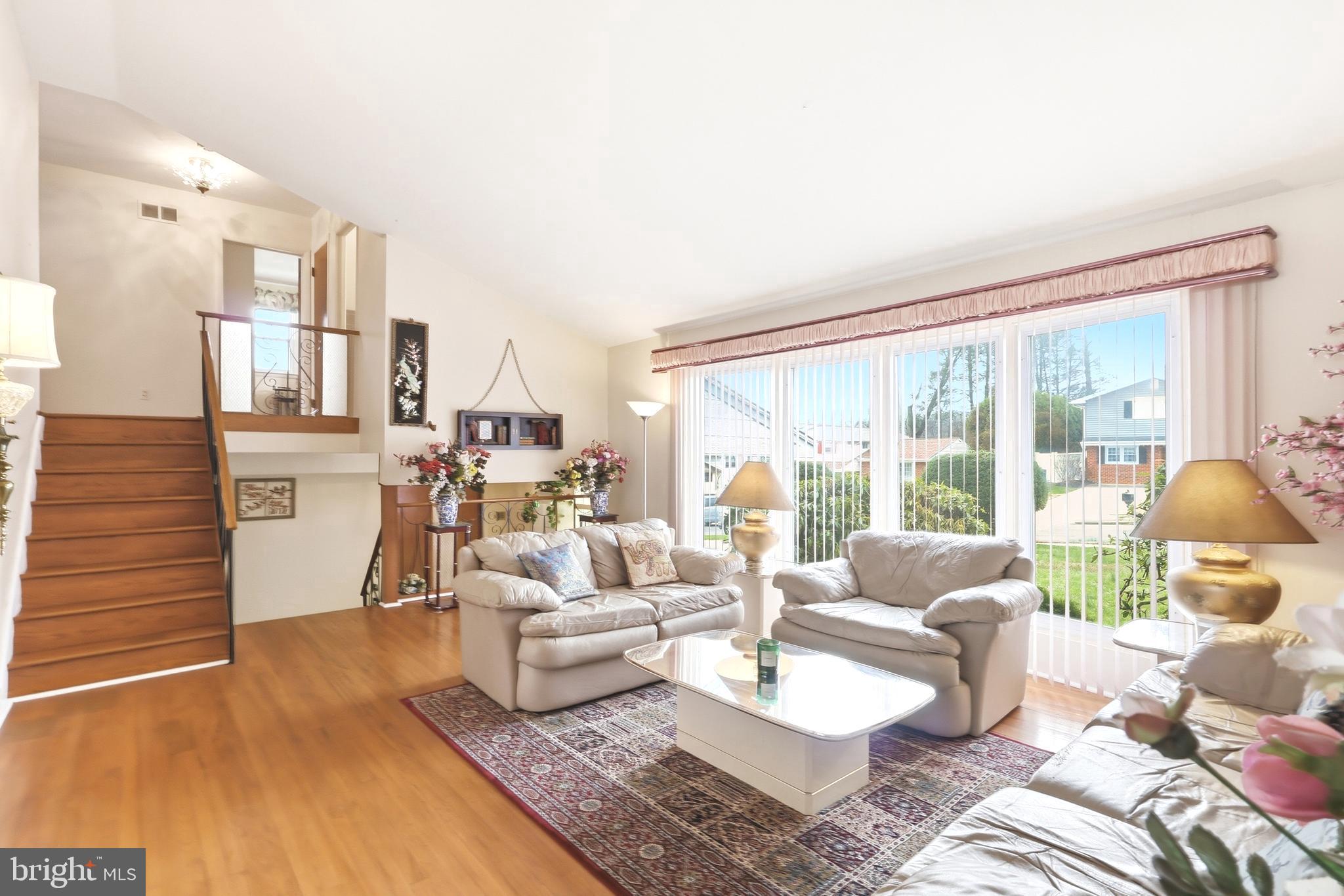 123 Pocasset Road Philadelphia, PA 19115 - Photo 6 of 35 a living room with furniture and a large window